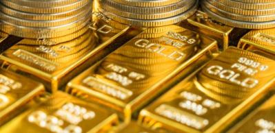 Vàng tích tắc vượt ngưỡng 2,000 USD khi đồng USD rớt giá