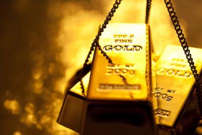 Vàng thế giới giảm hơn 1% khi đồng USD tăng giá