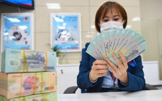 Yuanta Việt Nam: Thu nhập lãi ròng của các ngân hàng tăng 12% trong năm 2023