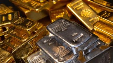 Vàng thế giới rớt hơn 60 USD xuống đáy 1 tuần