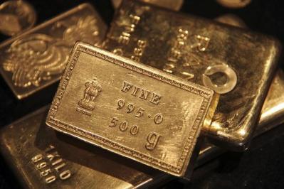 Vàng thế giới giảm hơn 1% chờ quyết định lãi suất của Fed