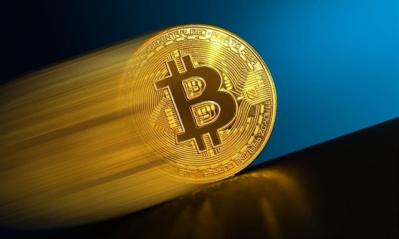 Bitcoin tích tắc tăng lên 48,000 USD nhờ tin giả