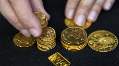 Vàng thế giới tăng gần 1% khi đồng USD suy yếu