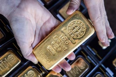 Vàng thế giới giảm khi đồng USD tăng trở lại