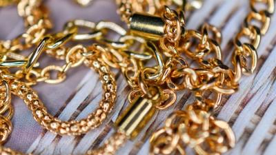 Vàng thế giới tăng khi đồng USD giảm
